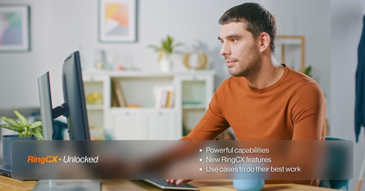 A man looking at a computer